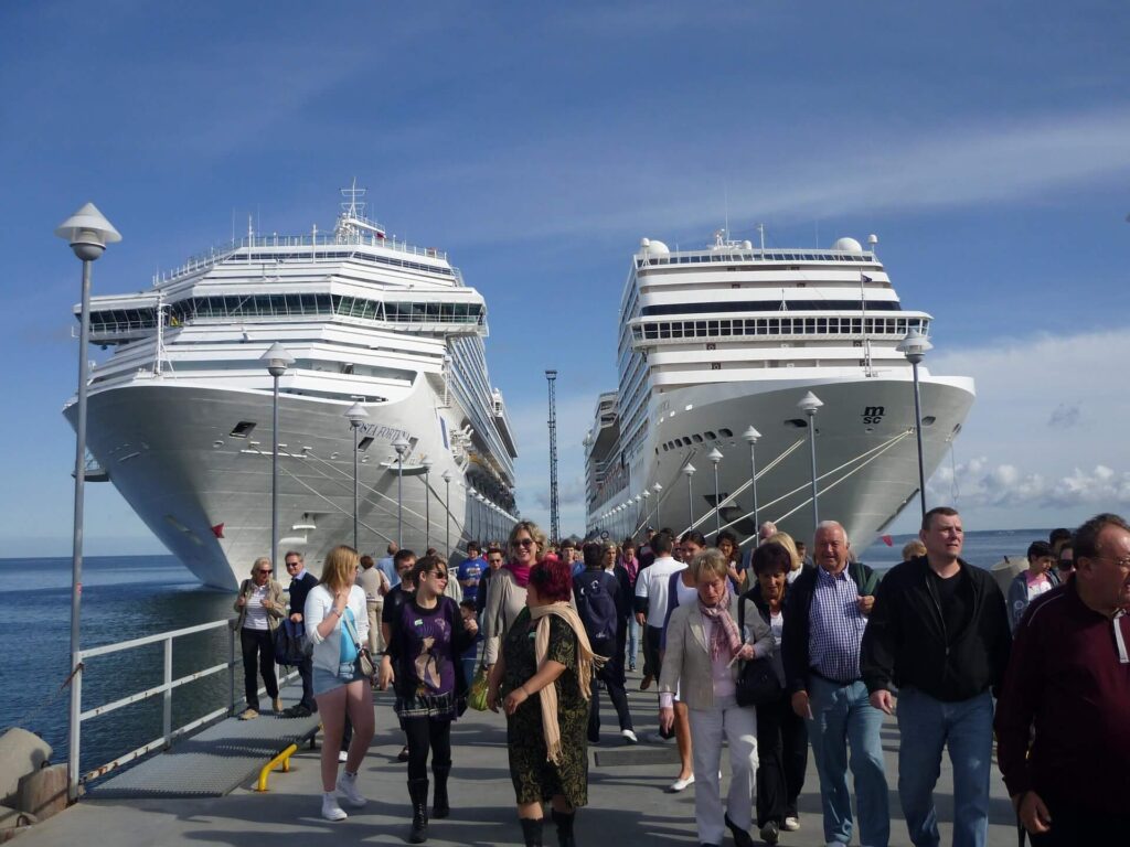 Cruise passengers arriving at port for shore excursions.